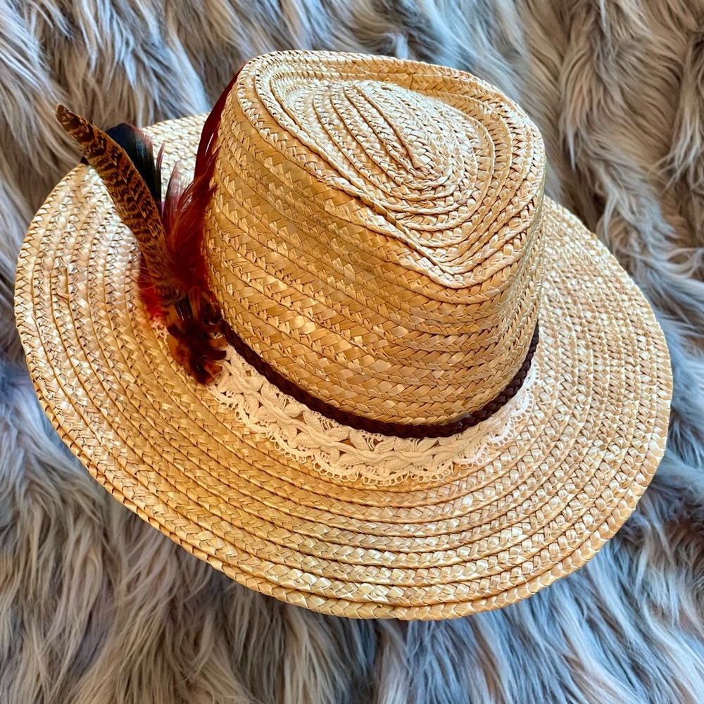 Stylish Straw Hat with Feather Accent
